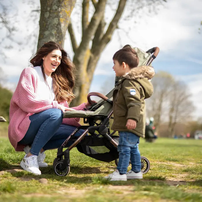 Aster 2 compact stroller in the park